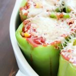 I have great memories of my mom making stuffed bell peppers for my family when I was a kid. This is a slight twist on her classic stuffed bell pepper recipe that I grew up eating and loving!