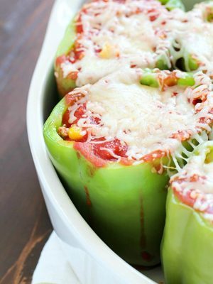 I have great memories of my mom making stuffed bell peppers for my family when I was a kid. This is a slight twist on her classic stuffed bell pepper recipe that I grew up eating and loving!