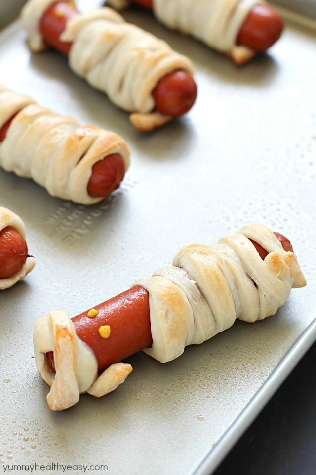 Looking for a fun, kid-friendly dinner for Halloween? Make these Hot Dog Mummies aka Mummy Dogs! A super cute and really easy recipe with only two main ingredients!