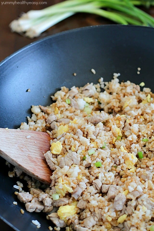 Crazy delicious kid-friendly, family-favorite Pork Fried Rice that's easy, only has seven simple ingredients, takes 20 minutes or less and will WOW any and everyone! Definitely PIN this for later!