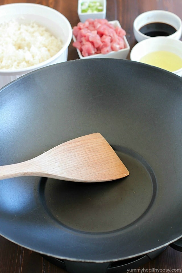 Crazy delicious kid-friendly, family-favorite Pork Fried Rice that's easy, only has seven simple ingredients, takes 20 minutes or less and will WOW any and everyone! Definitely PIN this for later!