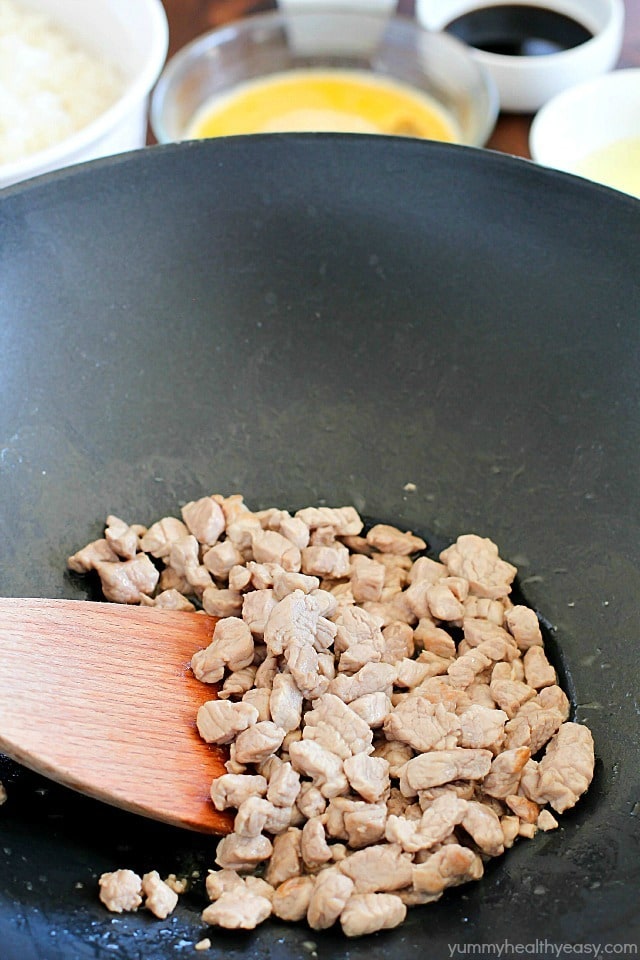 Crazy delicious kid-friendly, family-favorite Pork Fried Rice that's easy, only has seven simple ingredients, takes 20 minutes or less and will WOW any and everyone! Definitely PIN this for later!