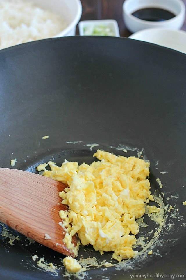 Crazy delicious kid-friendly, family-favorite Pork Fried Rice that's easy, only has seven simple ingredients, takes 20 minutes or less and will WOW any and everyone! Definitely PIN this for later!