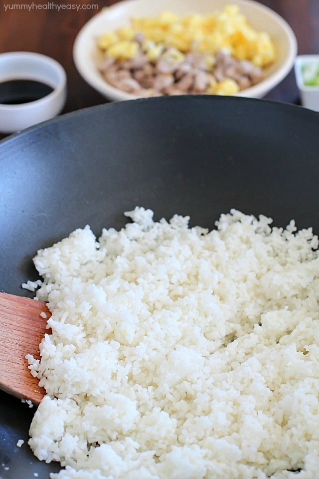Crazy delicious kid-friendly, family-favorite Pork Fried Rice that's easy, only has seven simple ingredients, takes 20 minutes or less and will WOW any and everyone! Definitely PIN this for later!