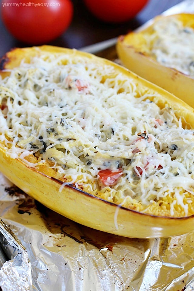 This recipe for Spinach & Artichoke Stuffed Spaghetti Squash is super easy and is a fabulous, flavorful, healthy meatless main or side dish. A healthy dish you can feel good about eating! #ad