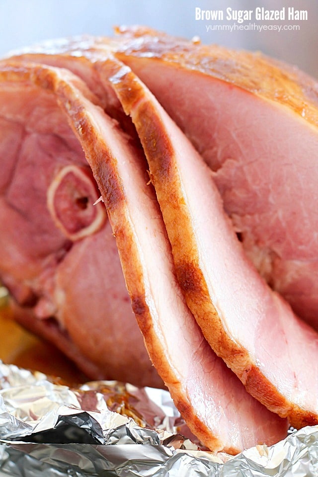 The juiciest, most tender Brown Sugar Glazed Ham ever and it's SO easy! Only a few simple ingredients to an incredible ham that will be a hit at your next holiday party!