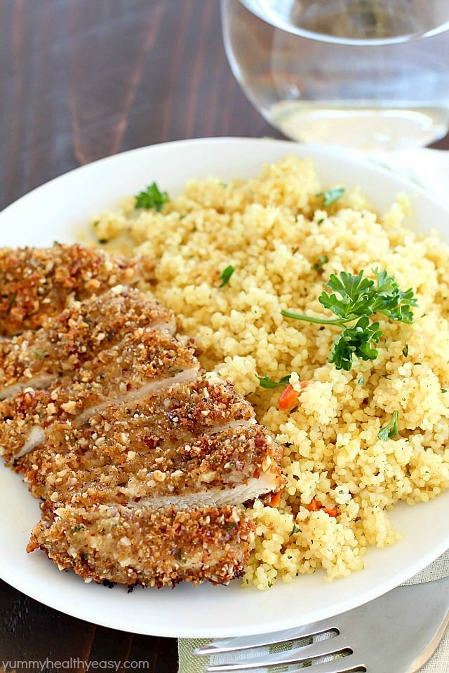 Healthy Baked Chicken Fingers with an almond-herb crust. These are my go-to easy dinner idea and my favorite way to eat chicken! They're incredibly flavorful and delicious! AD