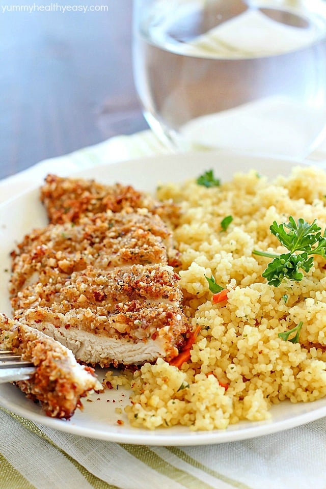 Healthy Baked Chicken Fingers with an almond-herb crust. These are my go-to easy dinner idea and my favorite way to eat chicken! They're incredibly flavorful and delicious! AD