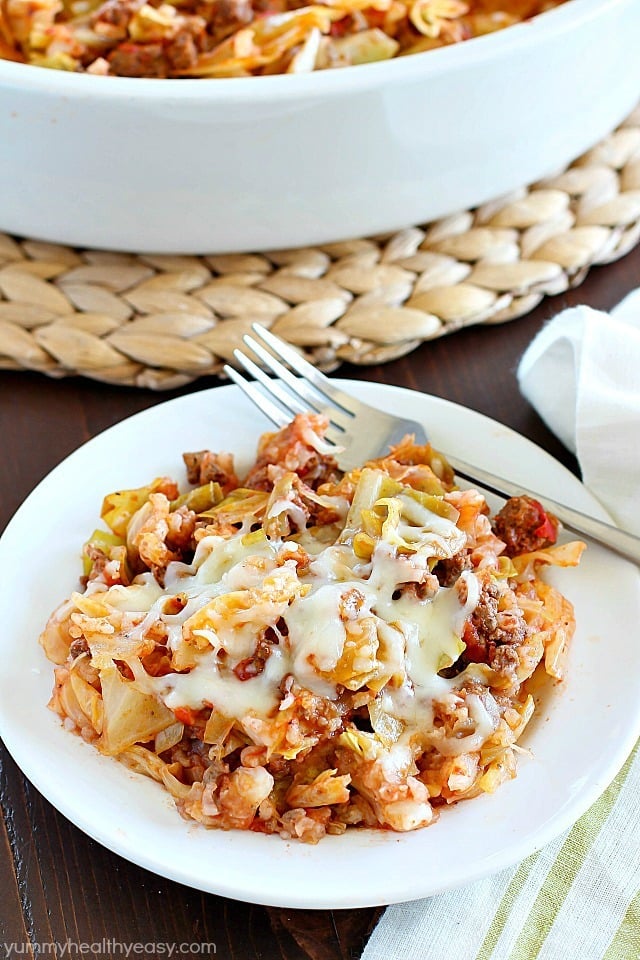Cabbage Roll Casserole is much easier than making traditional cabbage rolls! This yummy casserole is slowly baked and full of ground beef, rice and cabbage in a light tomato sauce. Hearty, simple to make and delicious!