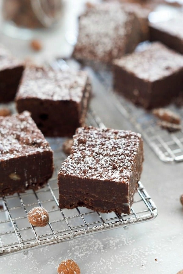 Rich and Fudgy Almond Butter Flourless Brownies are the perfect dessert that come together quickly and are lightened up with a few ingredient swaps!