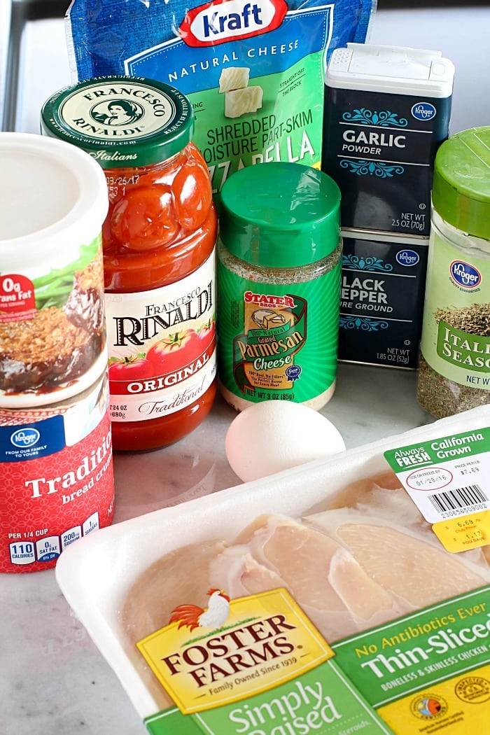 Time to change up that fattening Chicken Parmesan Recipe and make it skinny!! This lightened up comfort food dish is super easy to make and made healthier by baking instead of frying among other things. You need to add this Skinny Chicken Parmesan to your weekly dinner rotation!