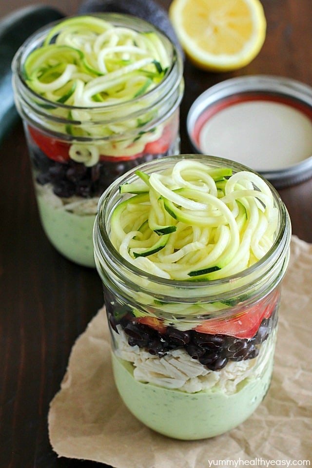 Avocado dressing (southwest style!) is nestled on the bottom of this delicious mason jar salad with zucchini noodles on the top and chicken, veggies and black beans tucked in the middle. A delicious and healthy low-carb, low-sugar lunch prepared ahead of time and eaten on-the-go! Plus a HUGE Blendtec Giveaway you won't want to miss!!