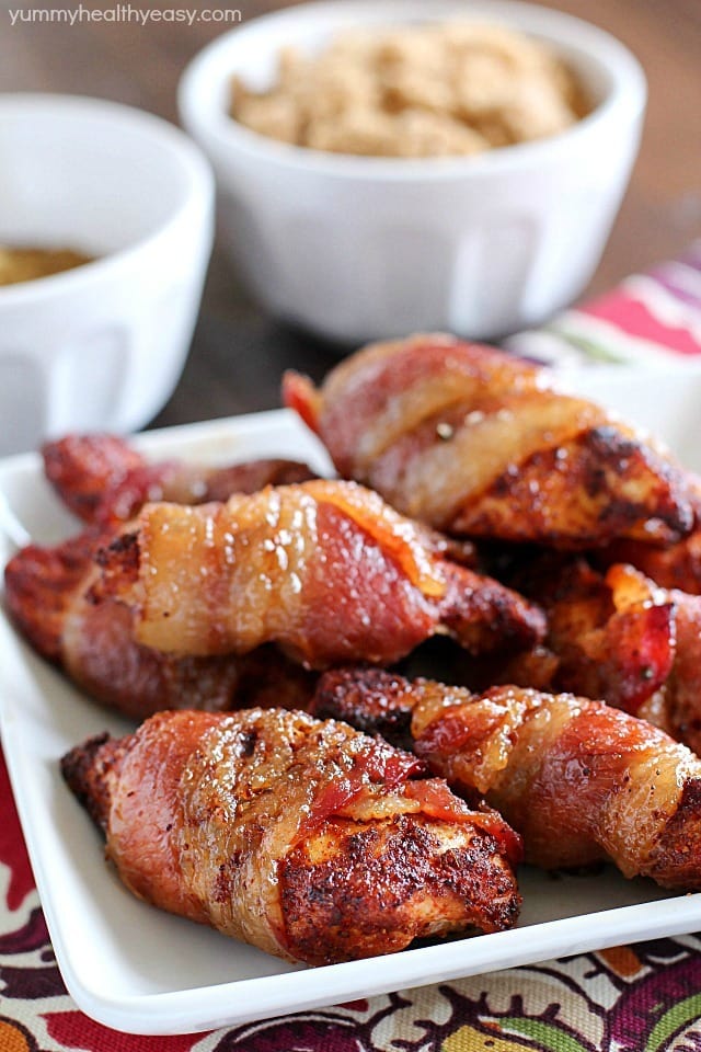 Brown Sugar Bacon Wrapped Chicken is one of my favorite dinners! Making this again tonight! You roll the chicken in spices and then wrap in bacon. Then roll in brown sugar and bake. SO easy, tender, juicy & flavorful. My family loves this chicken dinner! AD