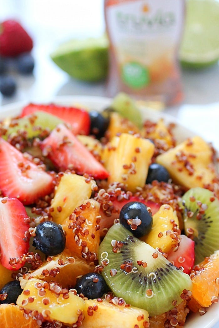 Quinoa Fruit Salad tossed in a Sweet Lime Dressing - a colorful, healthy side dish that goes with any meal! AD