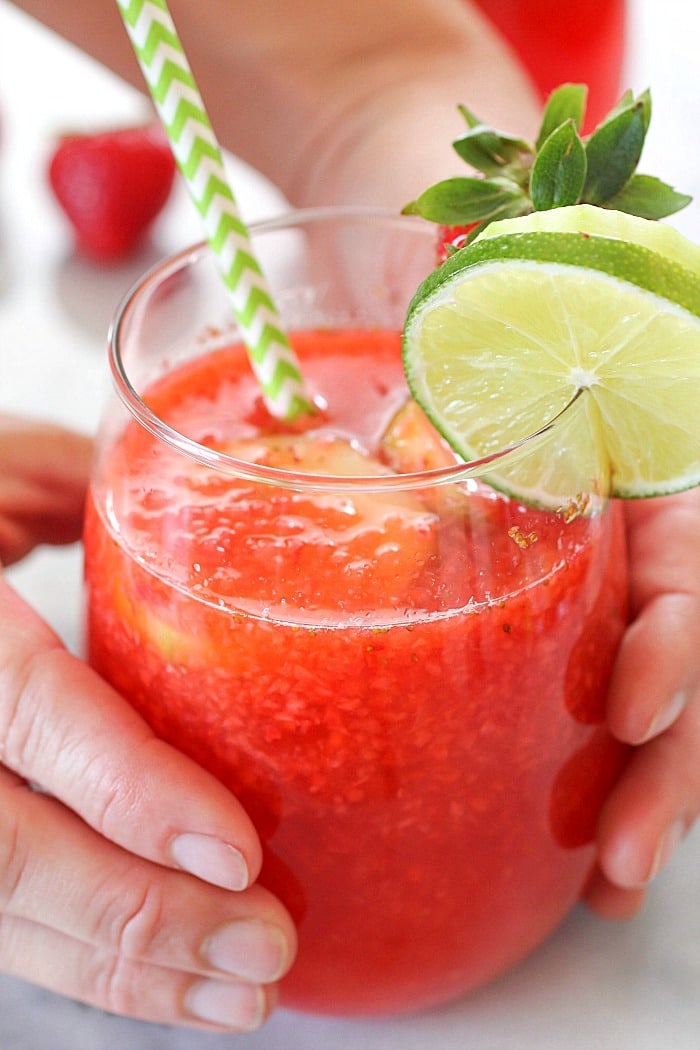 Strawberry Limeade to quench your thirst on a hot summer day! This drink recipe is a copycat of The Habit Burger Grill's Strawberry Limeade recipe. It's easy to make and lower-sugar thanks to Truvía® sweeteners! Definitely a must-make drink! AD
