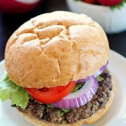 Quinoa Black Bean Burgers - meatless patties full of black beans, quinoa and spices. You won't believe these are vegetarian! The flavor is so delicious and only 270 calories per burger!
