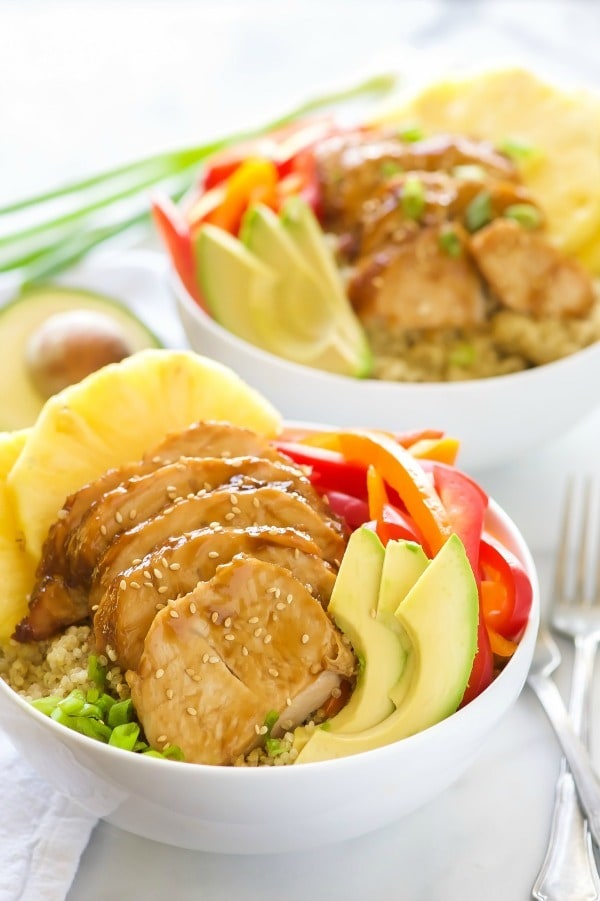 Honey Soy Glazed Hawaiian Bowls pack a serious flavor punch! Honey soy glazed turkey tenderloins are baked then added to a bowl filled with rice, juicy pineapple, peppers, onions, and avocados.