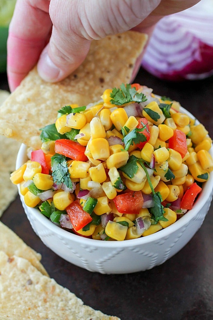 Corn Salsa recipe that's super easy to make and delicious! Using canned corn and other ingredients you probably already have on hand, this is the quickest salsa recipe & one of the most flavorful! Plus all about my Iowa Corn Quest trip! AD