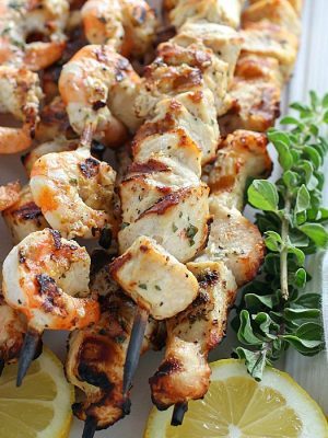 Lemon Oregano Chicken & Shrimp Skewers are marinated and then grilled for a delicious and healthy dinner recipe! Cue the hallelujah chorus! Deliciousness on a stick! This is also great for meal prepping! (high protein, paleo and clean eating)