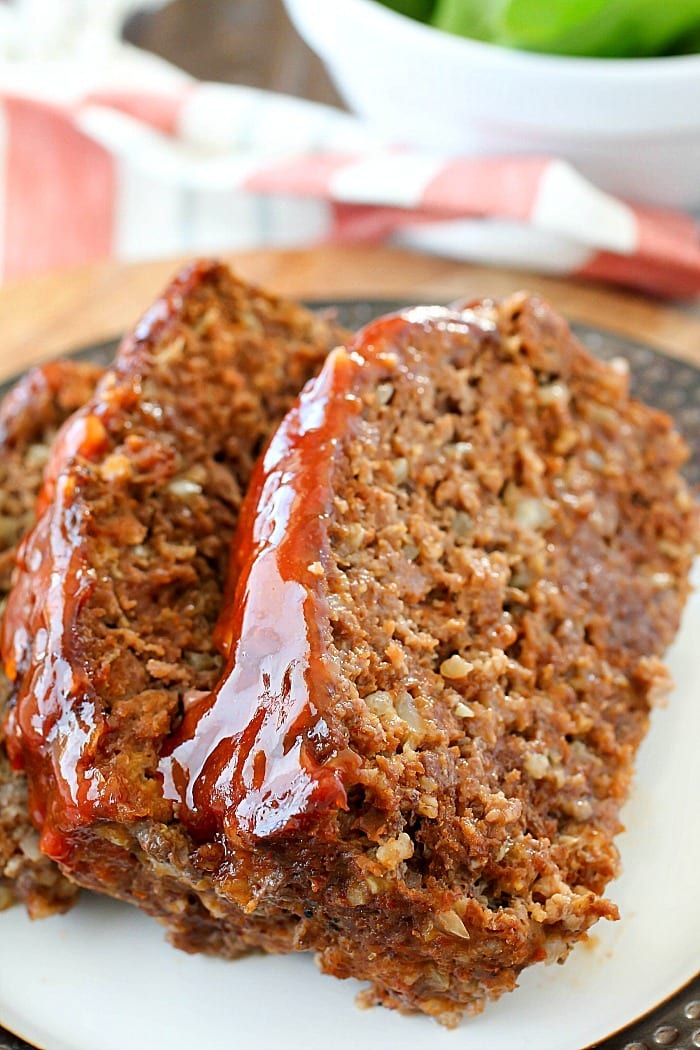This Meatloaf Recipe is my family's FAVORITE Sunday night dinner! It really is the Best Ever Meatloaf, and it is incredibly easy to make. So much flavor packed inside with a delicious glaze spread on the top!