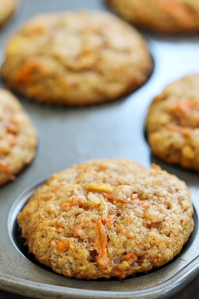 These Apple Carrot Muffins (also known as Sunshine Muffins) are full of carrots, apples, coconut, cinnamon & nutmeg. Your house will smell amazing after baking a batch of them!