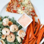 Baked Sweet Potato Fries and Shrimp Kale Caesar Salad