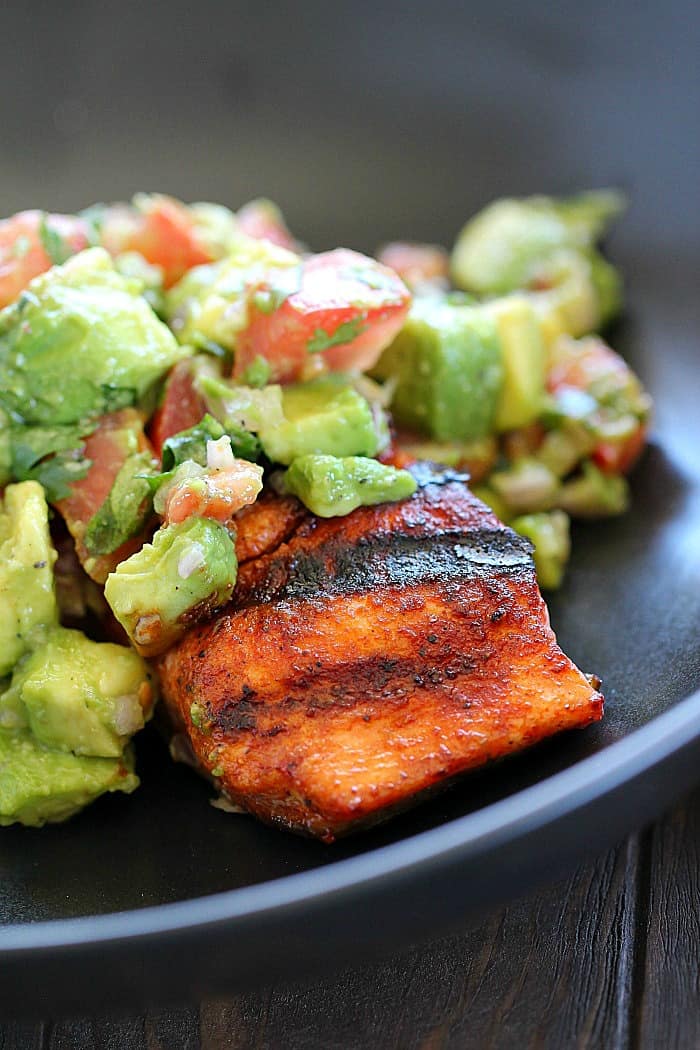 The whole family will go crazy for this Spicy Grilled Salmon with Avocado Salsa! Easy and quick to make and tastes like restaurant quality!