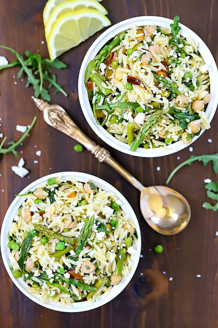 Top view of two bowls filled with Orzo Salad!