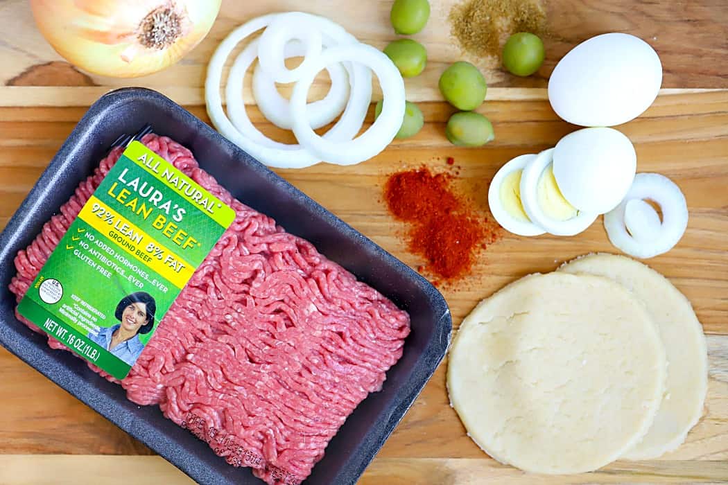 A flat lay overhead shot of the ingredients that go into Beef Empananadas