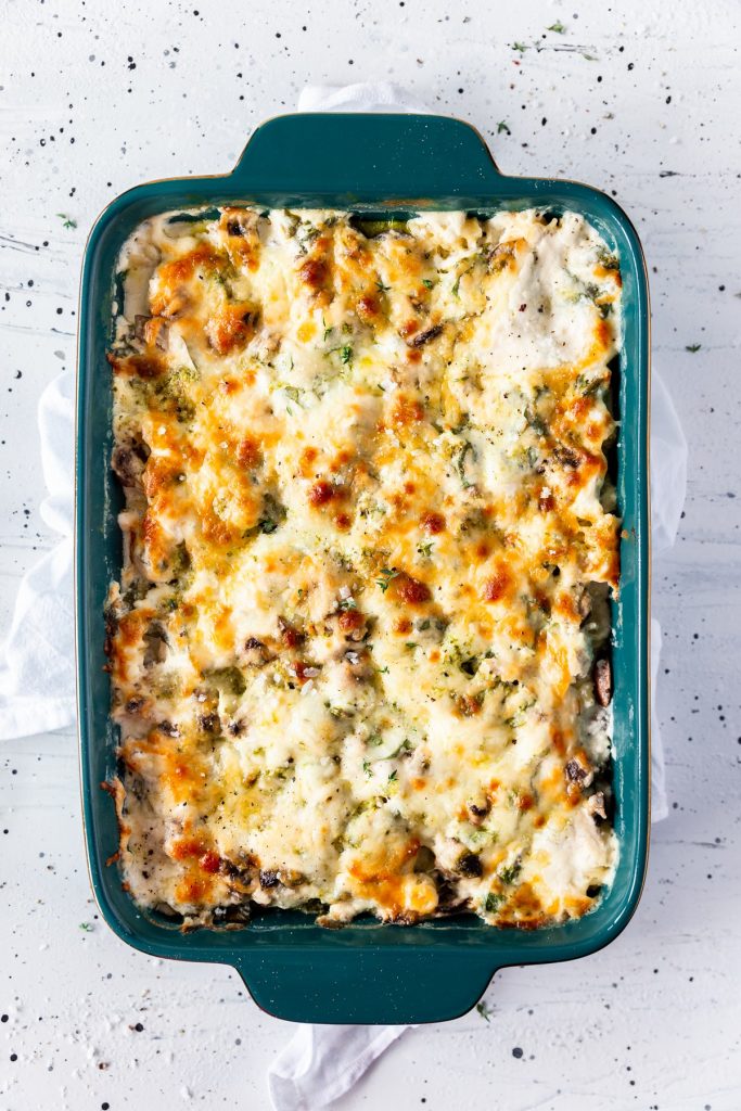 Overhead shot of a casserole dish filled with pasta and topped with cheese. :)
